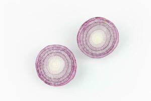 Sliced red onion isolated on white background. Top view. photo