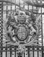 Gate with gilded ornaments in Buckingham Palace, London, England, UK photo