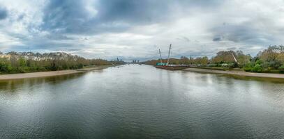 View over the river Thames from Chelsea Bridge, London, UK photo