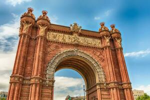 Arc de Triomf, iconic triumphal arc in Barcelona, Catalonia, Spain photo