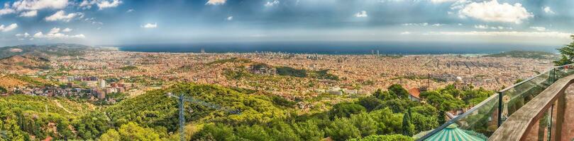 Panoramic view from Tibidabo mountain over Barcelona, Catalonia, Spain photo