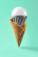 Led lamp in ice cream cone, innovation concept photo