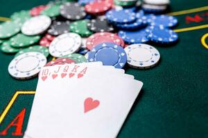 Poker chips on a table at the casino photo