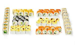 Set for big company with various Japanese sushi rolls photo