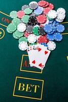 Poker chips on a table at the casino photo