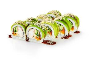 Avocado rolls with crab meat, masago, cucumbers, cream cheese, sesame and unagi sauce photo