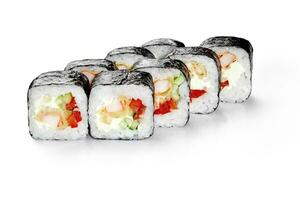 Futomaki sushi rolls with tempura shrimp, cream cheese, cucumbers and bell peppers photo