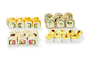 Japanese sushi set of baked rolls, makizushi tempura and uramaki for company photo