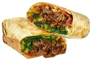 Traditional Mexican birria burrito with beef, french fries, vegetables and chimichurri sauce photo