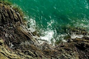 Rocks on the ocean photo