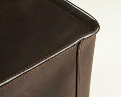 Close-up of brown storage box of leather and felt photo