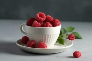 AI Generated raspberries in a white cup on the kitchen table photo