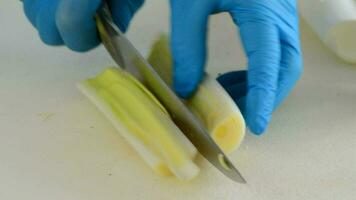 Cutting leek into small pieces for cooking video