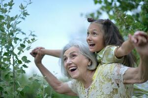 Portrait of grandmother and granddaughter photo