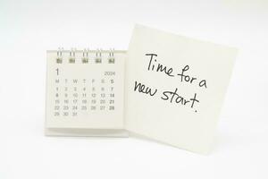 Time For A New Start text on paper with 2024 JAN calendar, Business Concept. New Year New Start. photo