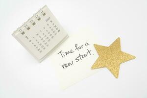 Time For A New Start text on paper with 2024 JAN calendar, Business Concept. New Year New Start. photo