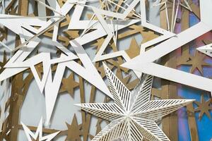Gold and Silver Stars Background. Chic Christmas. Festive border with falling glitter dust and stars. photo