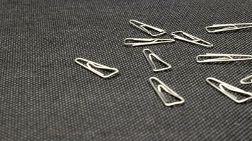 Close up of paper clips scattered photo