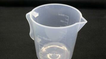 Transparent Graduated Beaker with Handle photo