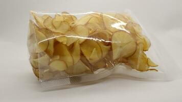 Cassava chips packaged using plastic. photo