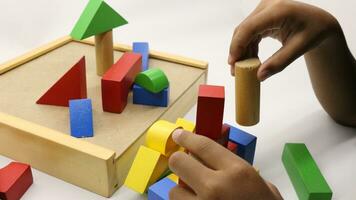 Colorful wooden puzzle toys being assembled photo