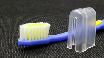 Close up blue toothbrush with cover photo