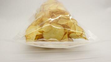 Cassava chips packaged using plastic. photo