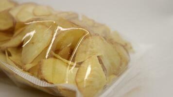 Cassava chips packaged using plastic. photo