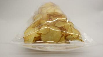 Cassava chips packaged using plastic. photo