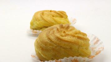 Two traditional cake Cream puffs photo