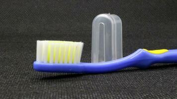 Close up blue toothbrush with cover photo