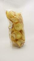 Cassava chips packaged using plastic. photo