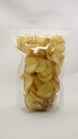 Cassava chips packaged using plastic. photo