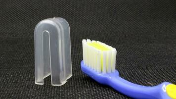 Close up blue toothbrush with cover photo