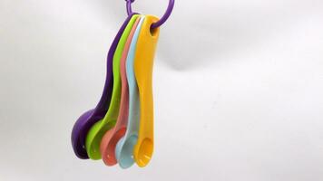 Measuring spoons in various colors photo