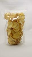 Cassava chips packaged using plastic. photo