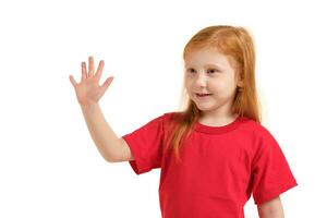 A little girl shows gesture - five fingers, isolated on white background photo