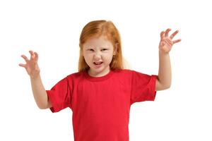 Portrait of cute redhead emotional little girl isolated on a white trying to scare someone photo