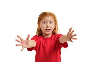 Portrait of cute redhead emotional little girl isolated on a white, trying to reach forward photo