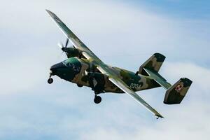 Polish Air Force PZL M28 Bryza transport plane flying. Aviation and military aircraft. photo