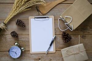 Christmas gift box composition on a wooden old background. Flat lay top view copy space photo