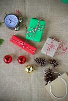Christmas gift box composition on a wooden old background. Flat lay top view copy space photo