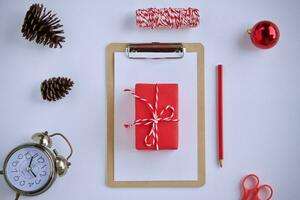 Christmas gift box composition on a white background. Flat lay top view copy space photo