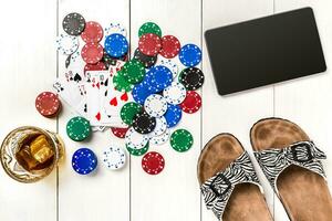 Post blog social media poker. Banner template layout mockup for online casino. Wooden white table, top view on workplace. photo