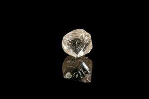 Macro mineral stone diamond on a black background photo