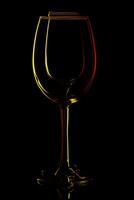 beautiful glass of wine on a black background photo