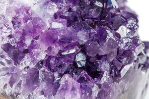 Amethyst Crystal Druse  macro mineral on white background photo