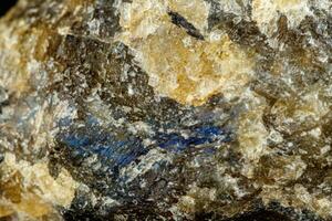 macro mineral stone Labradorite on a black background photo