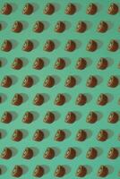 Pattern of kiwi. Top view of the sliced kiwi on blue background. Minimal flat lay concept. photo