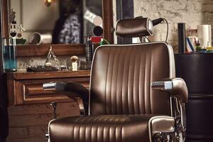 Barbershop armchair. Modern hairdresser and hair salon, barber shop for men. photo